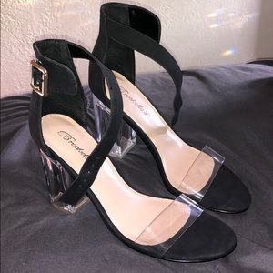 Black and clear heels